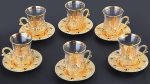 Tea Glass and Saucer set in gold color.
