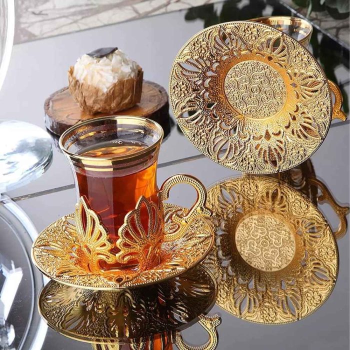 Tea Glass and Saucer set in gold color.